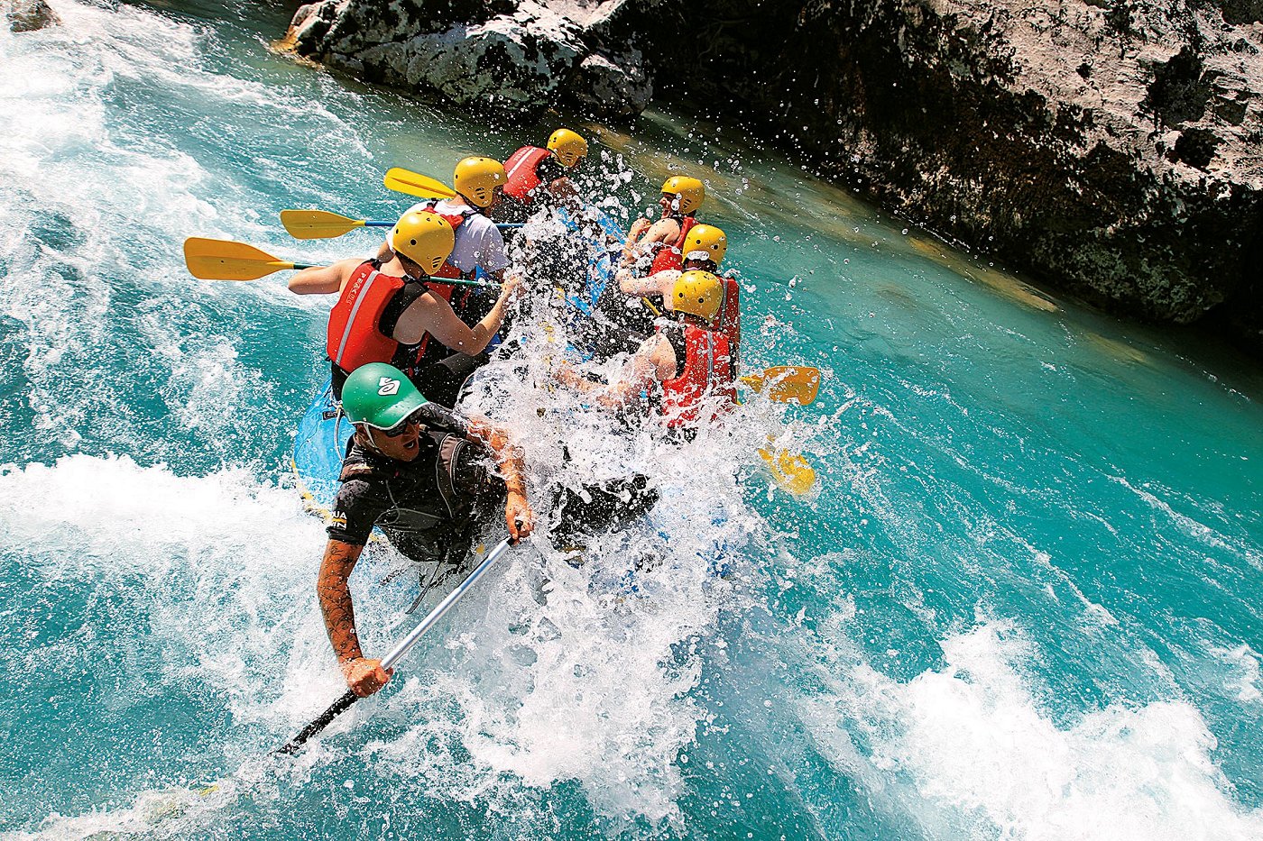 A group enjoying the Soča river rapids