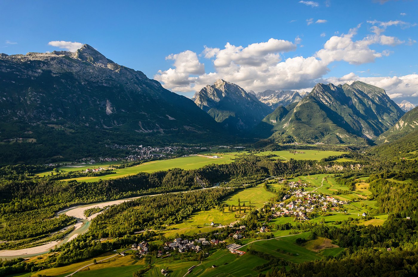 View of the town of Bovec and the village of Čezsoča, between which the river Soča flows, in the background the local mountains