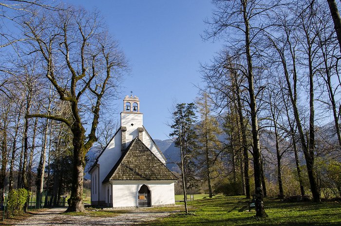 Exterior of the church with Gothic architecture and wooden roof