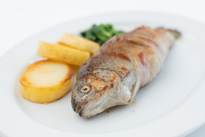 Letni vrt - Trout stuffed with sheep\'s curd and wrapped in pancetta