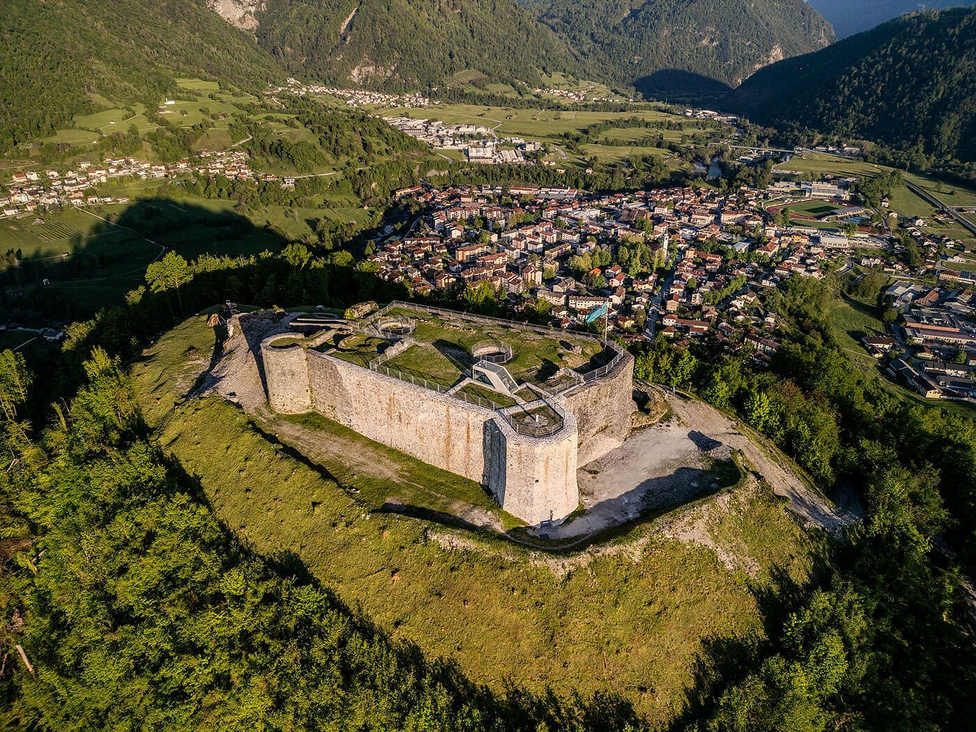 Interpretation Centre Kozlov rob with the town of Tolmin in the background